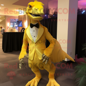 Yellow Utahraptor mascot costume character dressed with a Evening Gown and Tie pins