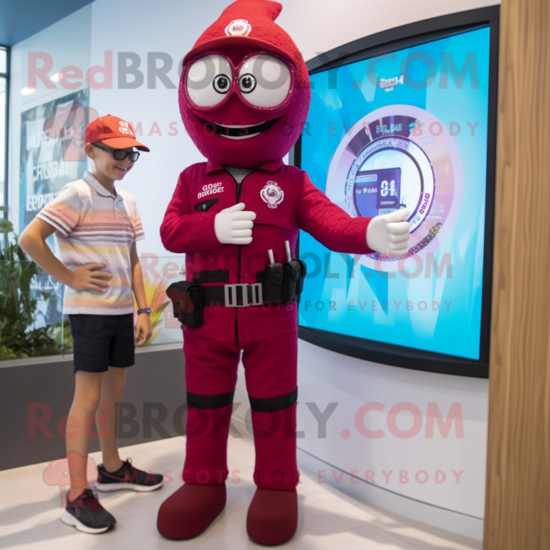 Maroon Police Officer mascot costume character dressed with a Swimwear and Digital watches