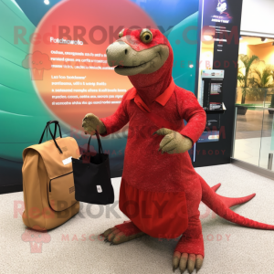 Red Komodo Dragon mascot costume character dressed with a Mini Dress and Messenger bags