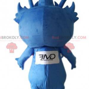 Kleine blauwe alien mascotte met scherpe tanden. -