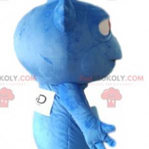 Mascot pequeño alienígena azul con dientes afilados. -