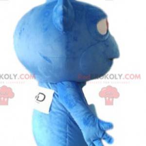 Mascote alienígena azul com dentes afiados. - Redbrokoly.com