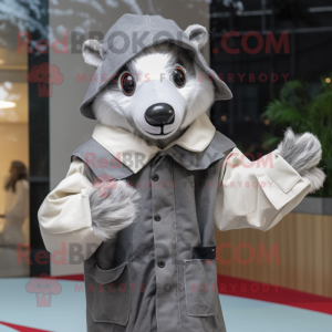 Gray Badger mascot costume character dressed with a Raincoat and Gloves