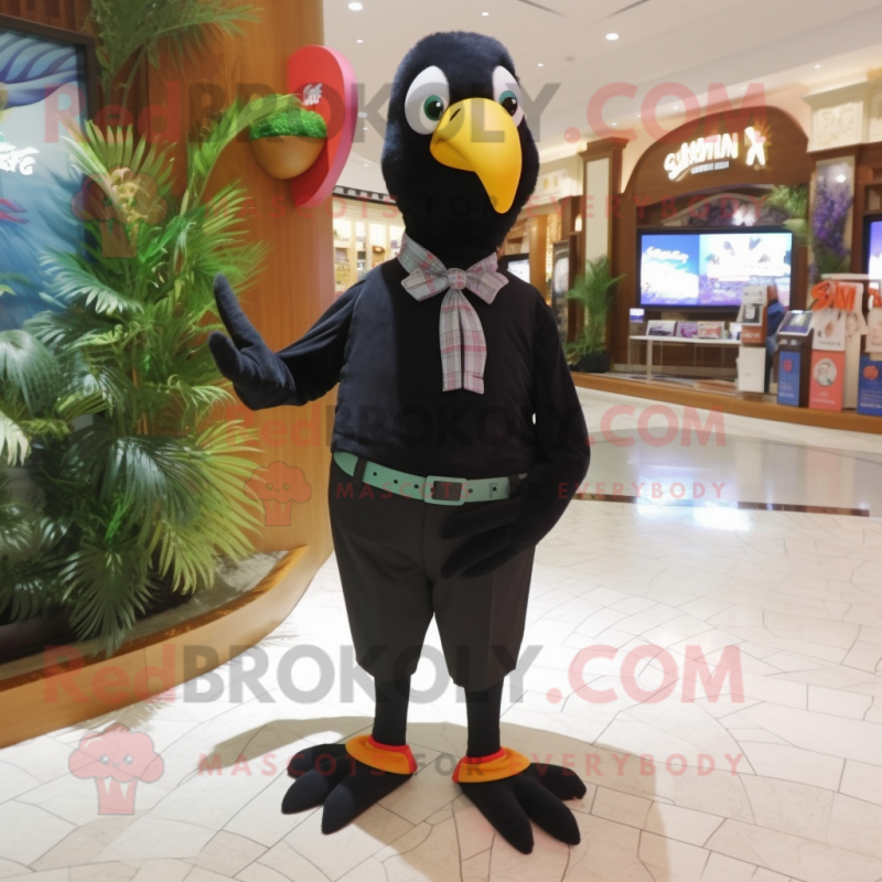 Black Parrot mascot costume character dressed with a Capri Pants and Bow ties