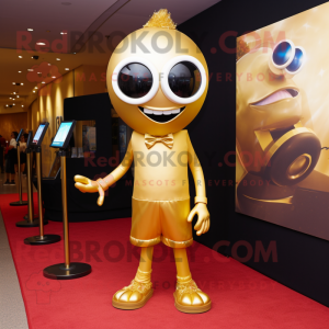 Gold Cyclops mascot costume character dressed with a A-Line Dress and Tie pins
