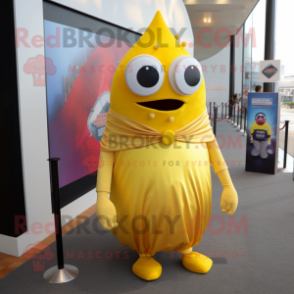 Gold Cyclops mascot costume character dressed with a A-Line Dress and Tie pins