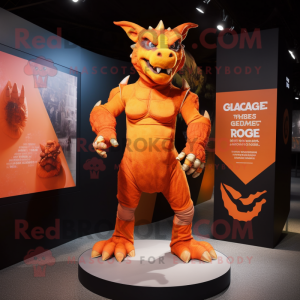 Orange Gargoyle mascot costume character dressed with a Rash Guard and Anklets