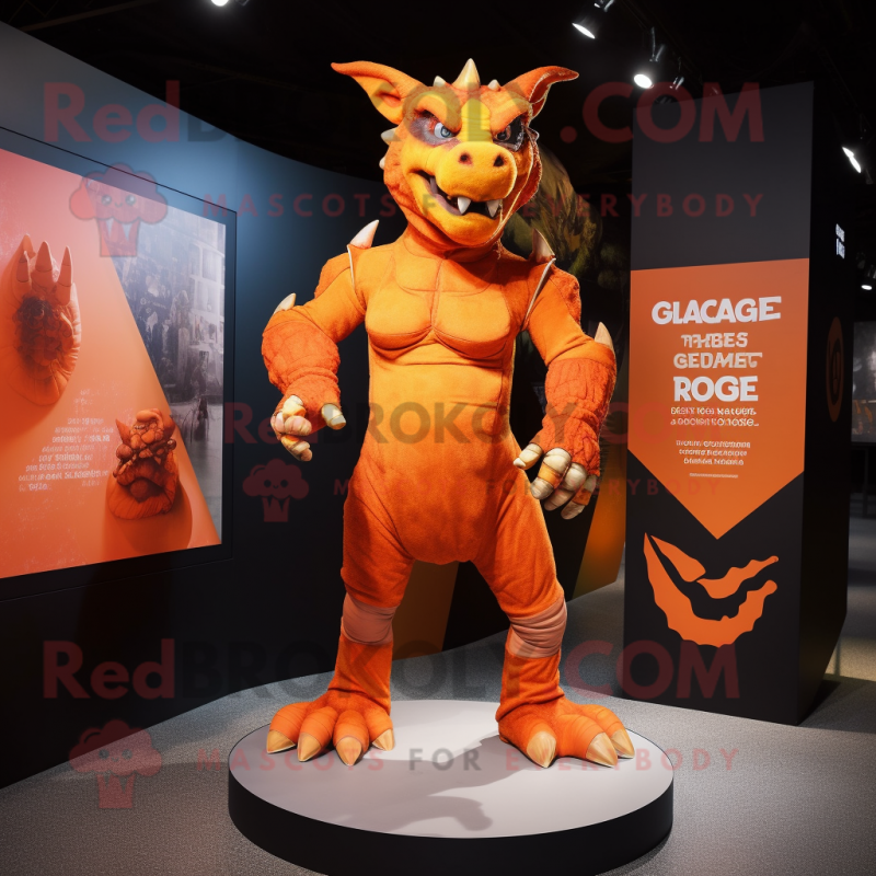Orange Gargoyle mascot costume character dressed with a Rash Guard and Anklets Orange Gargoyle mascot costume character dressed with a Rash Guard and Anklets