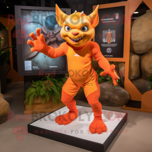 Orange Gargoyle mascot costume character dressed with a Rash Guard and Anklets