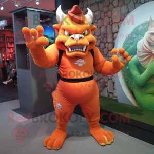 Orange Gargoyle mascot costume character dressed with a Rash Guard and Anklets