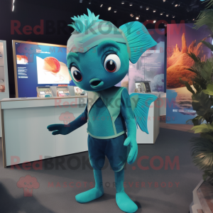 Teal Betta Fish mascot costume character dressed with a Playsuit and Lapel pins