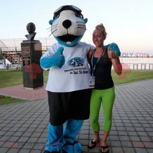 Blue and white sea lion mascot with shorts and a t-shirt -