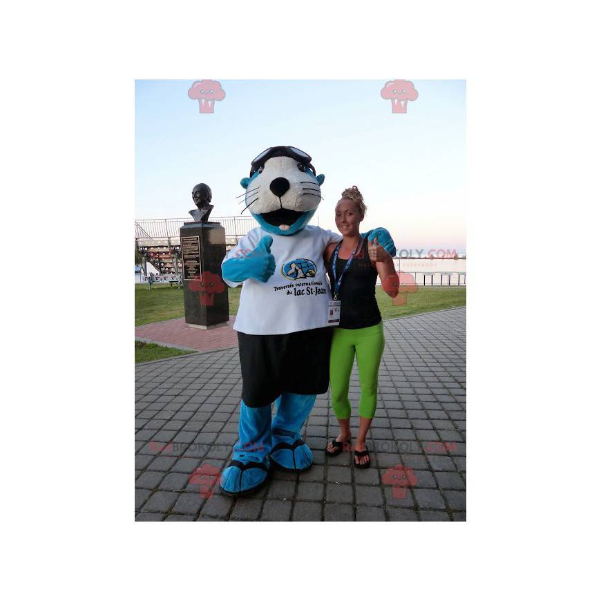 Blue and white sea lion mascot with shorts and a t-shirt -