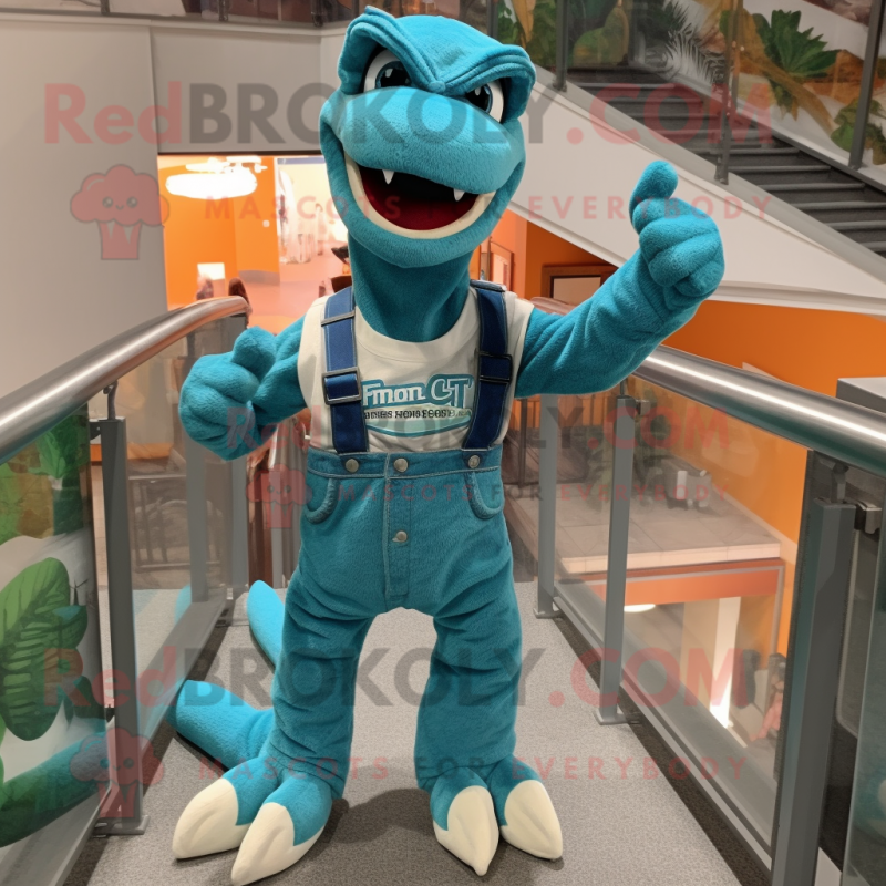 Teal Velociraptor mascot costume character dressed with a Overalls and Keychains Teal Velociraptor mascot costume character dressed with a Overalls and Keychains