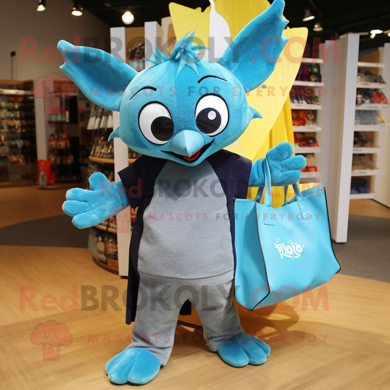 Cyan Bat mascot costume character dressed with a Jeggings and Tote bags