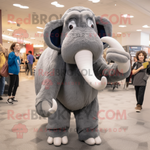 Gray Mammoth mascot costume character dressed with a Jeggings and Eyeglasses