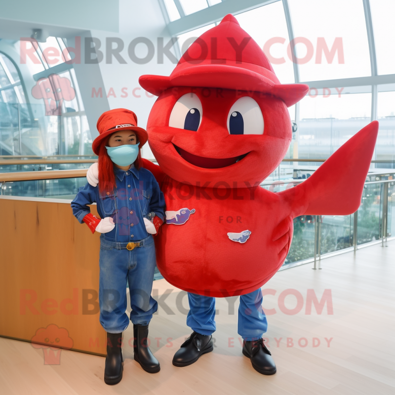 Red Swordfish mascot costume character dressed with a Boyfriend Jeans and Berets