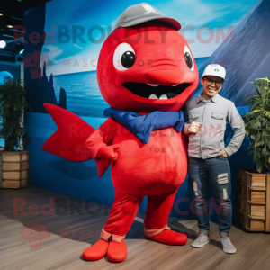 Red Swordfish mascot costume character dressed with a Boyfriend Jeans and Berets