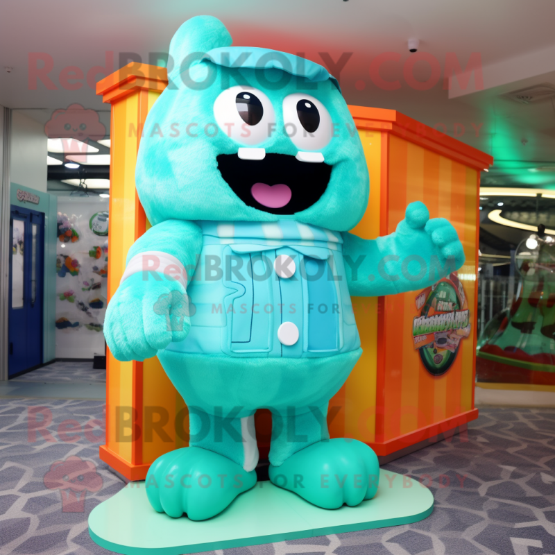 Cyan Candy Box mascot costume character dressed with a Cover-up and Suspenders Cyan Candy Box mascot costume character dressed with a Cover-up and Suspenders