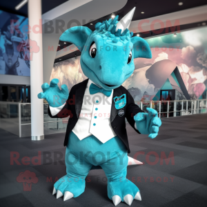 Turquoise Triceratops mascot costume character dressed with a Tuxedo and Mittens