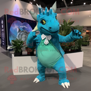 Turquoise Triceratops mascot costume character dressed with a Tuxedo and Mittens
