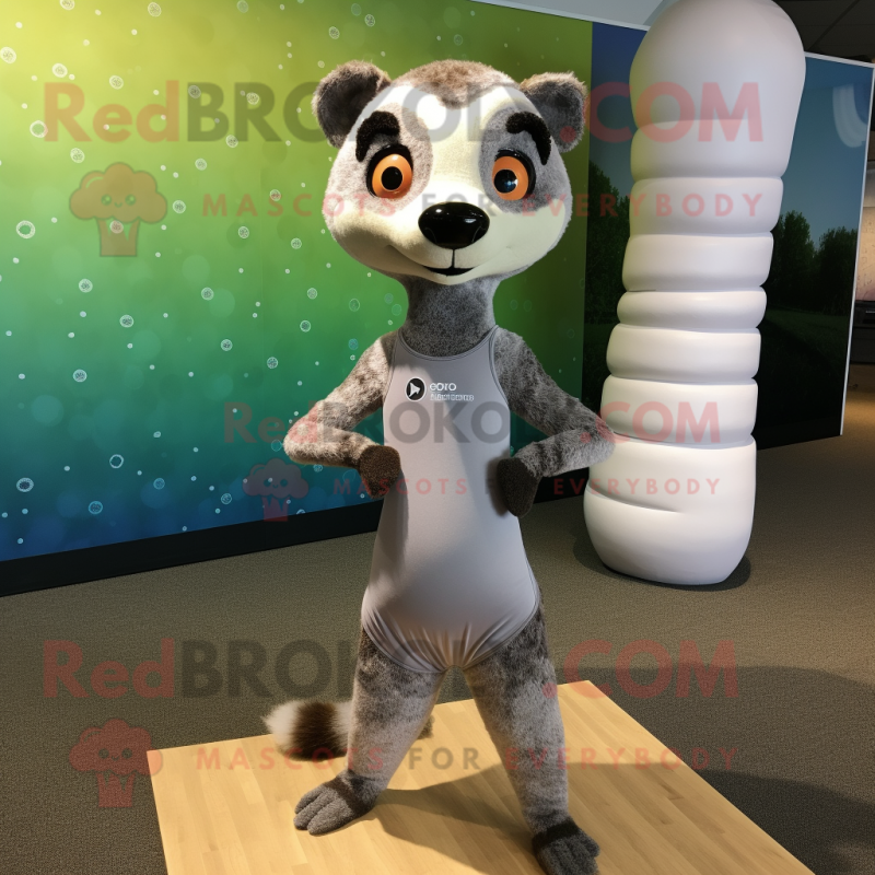 Silver Meerkat mascot costume character dressed with a Yoga Pants and Bow ties