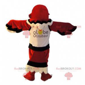 Mascot águila roja en una camiseta deportiva. Disfraz de águila