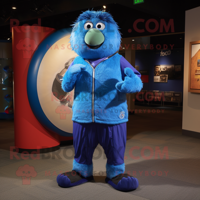 Blue Kiwi mascot costume character dressed with a Turtleneck and Rings Blue Kiwi mascot costume character dressed with a Turtleneck and Rings