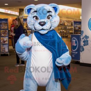 Blue Mountain Lion mascot costume character dressed with a Boyfriend Jeans and Scarves