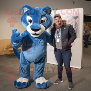 Blue Mountain Lion mascot costume character dressed with a Boyfriend Jeans and Scarves