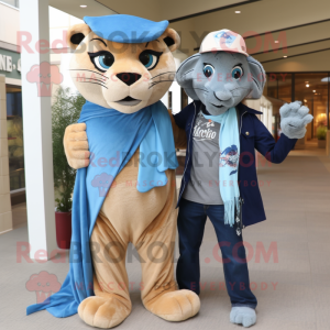 Blue Mountain Lion mascot costume character dressed with a Boyfriend Jeans and Scarves