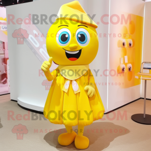 Yellow Candy mascot costume character dressed with a Pencil Skirt and Headbands