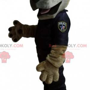 Maskot německého ovčáka oblečený jako policista. -
