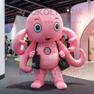 Pink Kraken mascot costume character dressed with a Jumpsuit and Handbags