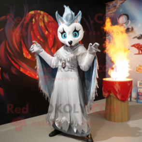 Silver Fire Eater mascot costume character dressed with a Shift Dress and Shawls