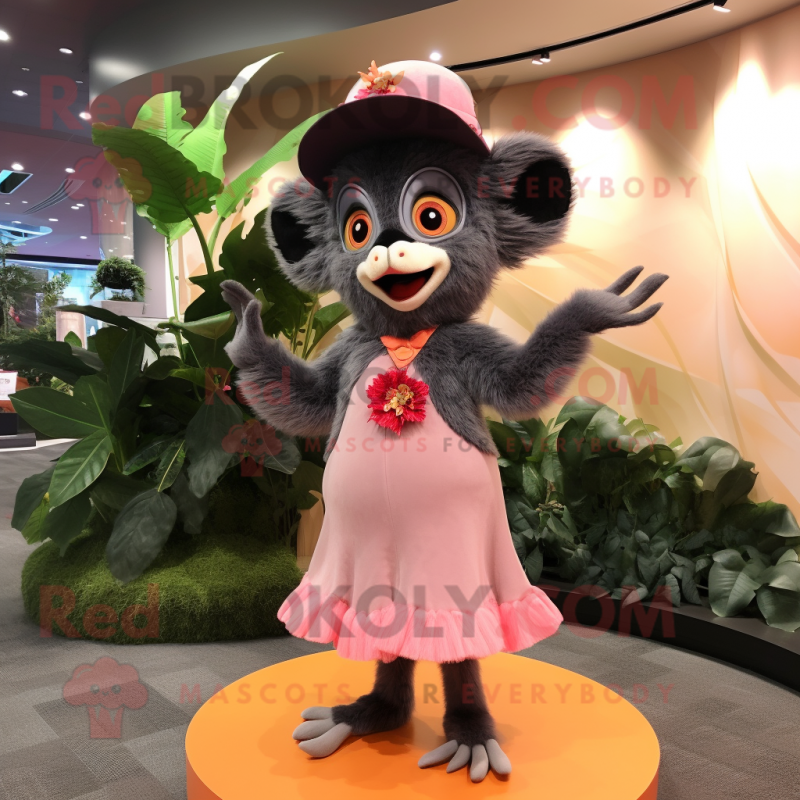 Peach Aye-Aye mascot costume character dressed with a Circle Skirt and Hats