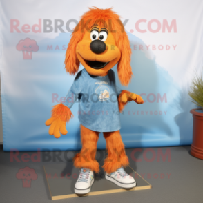Orange Shepard'S Pie mascot costume character dressed with a Chambray Shirt and Shoe laces