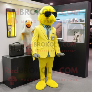 Lemon Yellow Parrot mascot costume character dressed with a Suit Jacket and Messenger bags