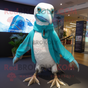 Turquoise Albatross mascot costume character dressed with a Joggers and Wraps