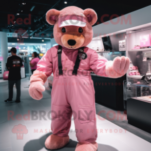 Pink Teddy Bear mascot costume character dressed with a Overalls and Gloves