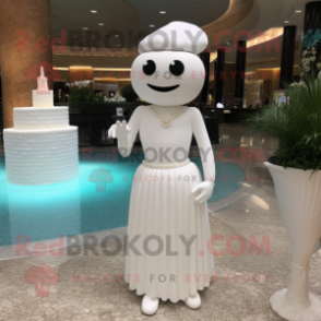 White Wedding Cake mascot costume character dressed with a One-Piece Swimsuit and Shawl pins