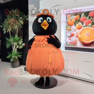 Peach Blackbird mascot costume character dressed with a Shift Dress and Rings