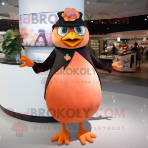Peach Blackbird mascot costume character dressed with a Shift Dress and Rings