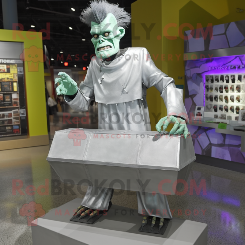 Silver Frankenstein mascot costume character dressed with a Long Sleeve Tee and Brooches