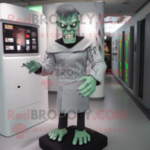 Silver Frankenstein mascot costume character dressed with a Long Sleeve Tee and Brooches
