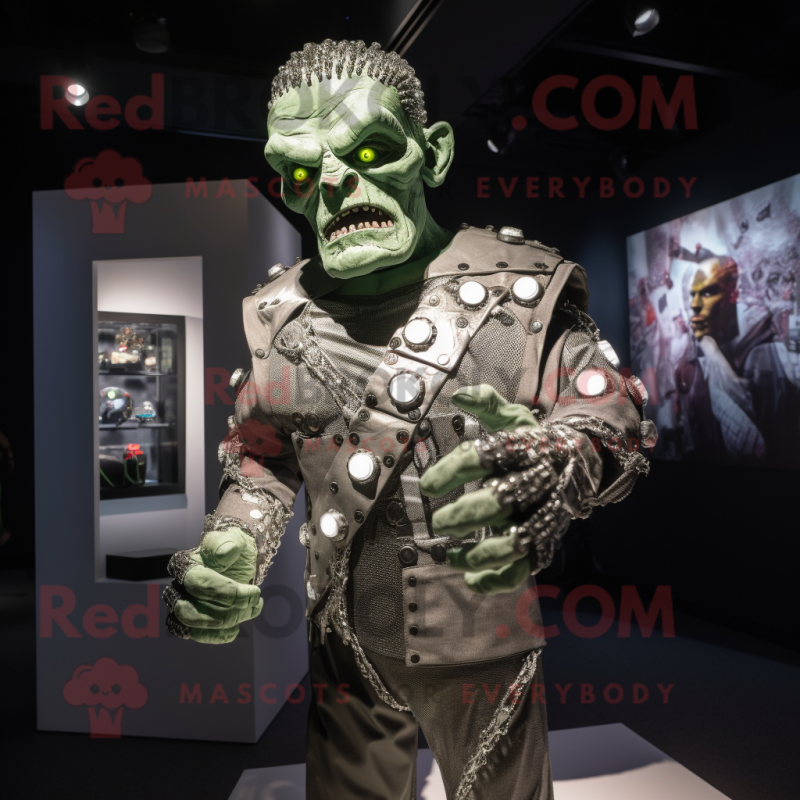 Silver Frankenstein mascot costume character dressed with a Long Sleeve Tee and Brooches