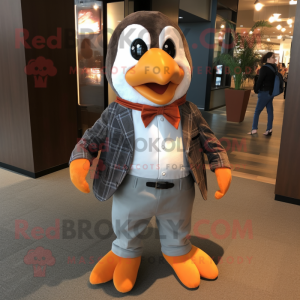 Rust Penguin mascot costume character dressed with a Dress Shirt and Pocket squares