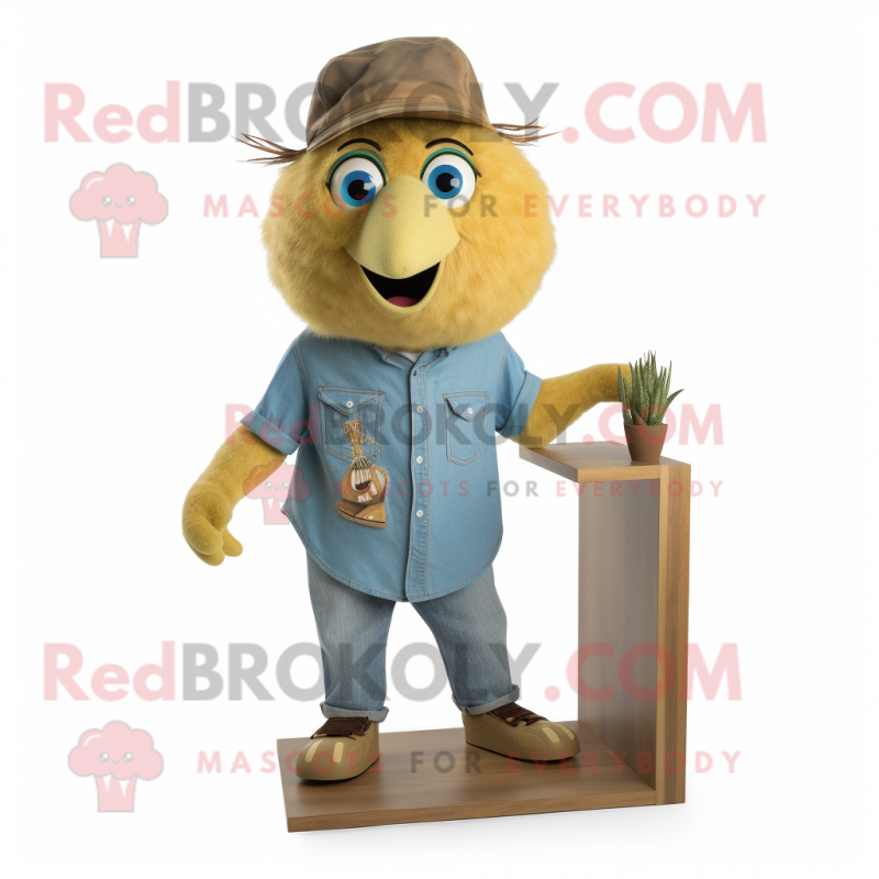 Gold Kiwi mascot costume character dressed with a Denim Shirt and Shoe clips Gold Kiwi mascot costume character dressed with a Denim Shirt and Shoe clips