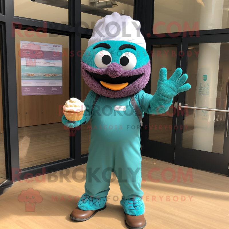 Teal Cupcake mascot costume character dressed with a Romper and Headbands Teal Cupcake mascot costume character dressed with a Romper and Headbands
