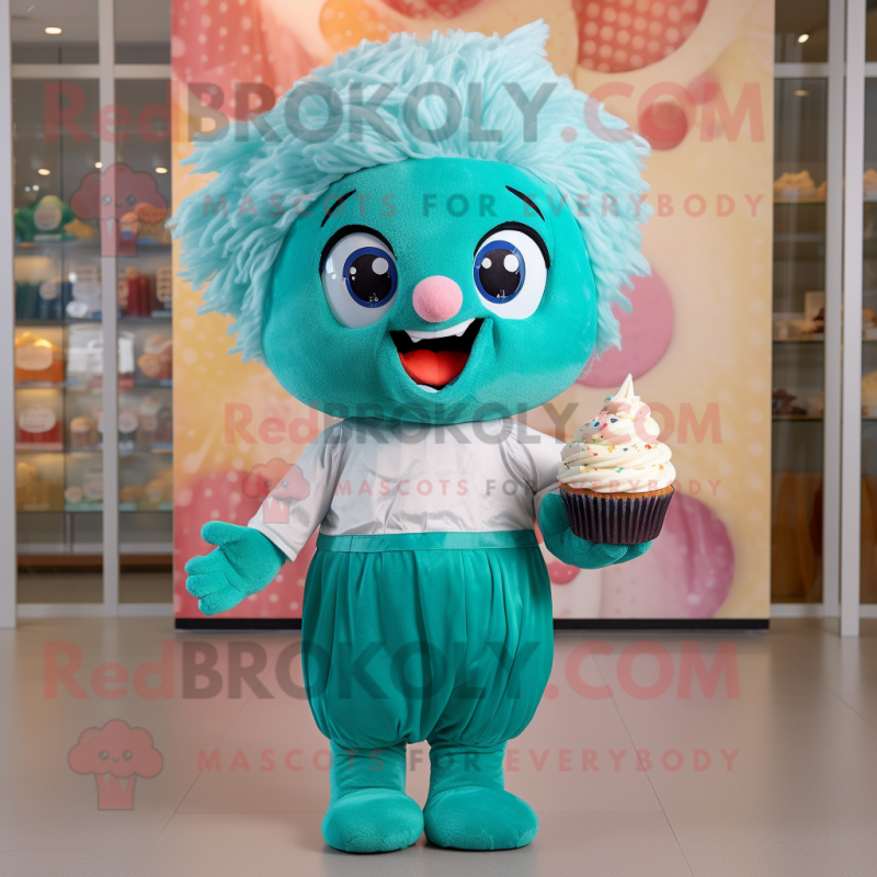 Teal Cupcake mascot costume character dressed with a Romper and Headbands